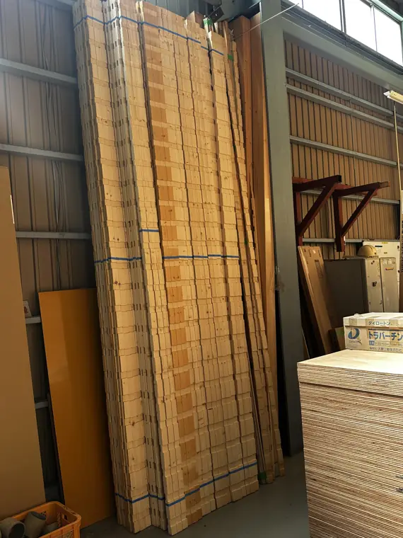 Japanese interior door panels and storage units stored upright in the EST warehouse